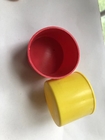 Le tube jaune de tuyau d'échafaudage finit les granules en plastique de chapeaux de sécurité